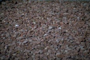 Pea gravel is a relatively inexpensive small stone produced regionally 