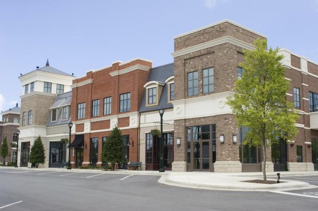 row of shops on small town street(jnatkin/iStock/Getty Images)