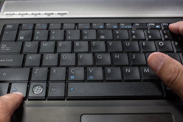 how to turn off function key lock on hp laptop