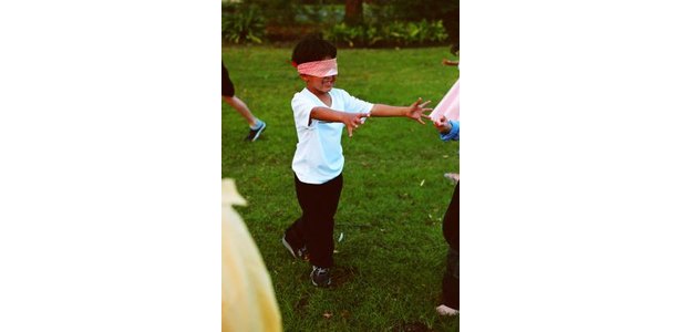 child with blindfold