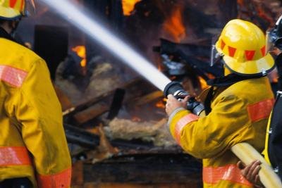 firefighters rescuing people