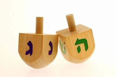 How Is Hanukkah Celebrated Today? thumbnail Playing with dreidels is a