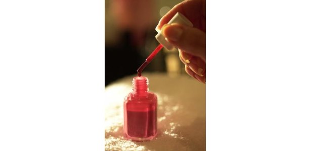 How to Apply Water Marbling Nail Art thumbnail Red nail polish gives water