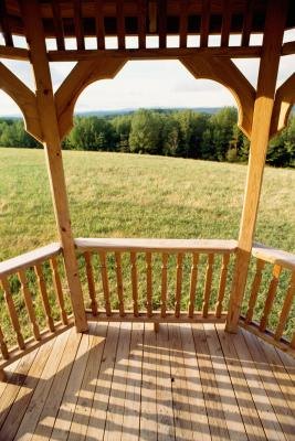How to Landscape a Backyard on a Hill With a Tall Porch