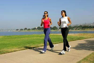Two women jogging together