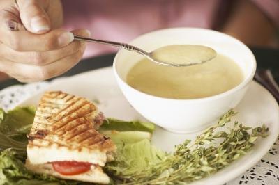 Many lunch specials offer a cup of soup and one-half sandwich as part of their light menu.