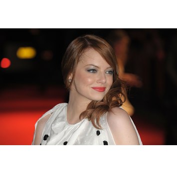 Emma Stone highlights her eyes and cheekbones with a dash of shine