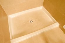 Clamping ring drains install under shower pans.