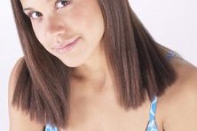 The air drying scarf method straightens hair without heat damage.