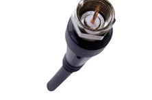 The core wire in the center of the coax cable carries the signal.