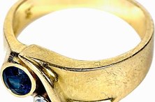 A gold ring can be buffed and polished with a Dremel.