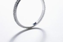 An eternity ring is often worn on the same finger as the wedding band and engagement ring.