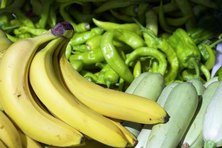Green plantains turn yellow as they ripen.