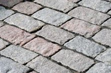 Color hardener and a stamp mold can replicate the look of real stone.