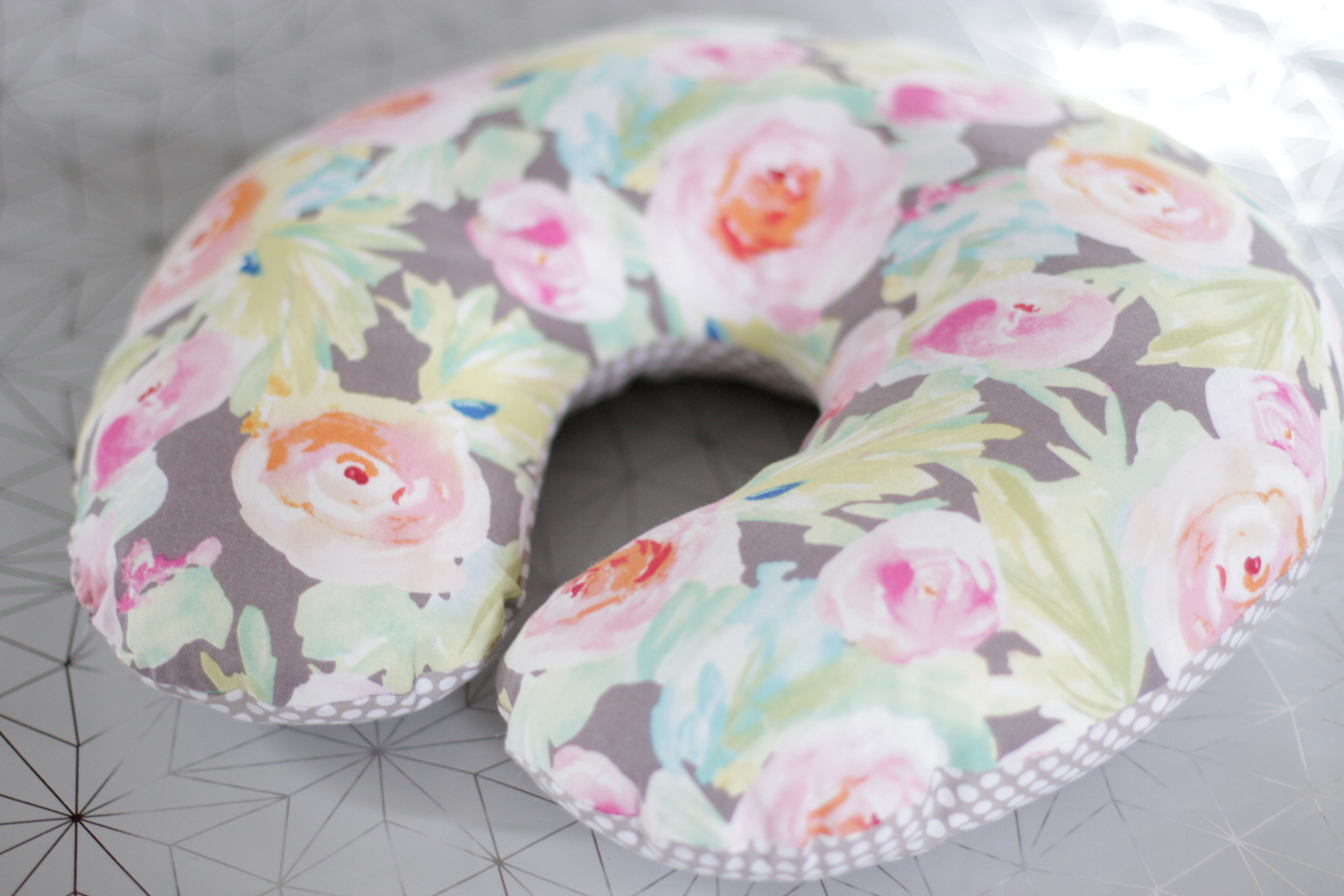 Floral neck outlet pillow