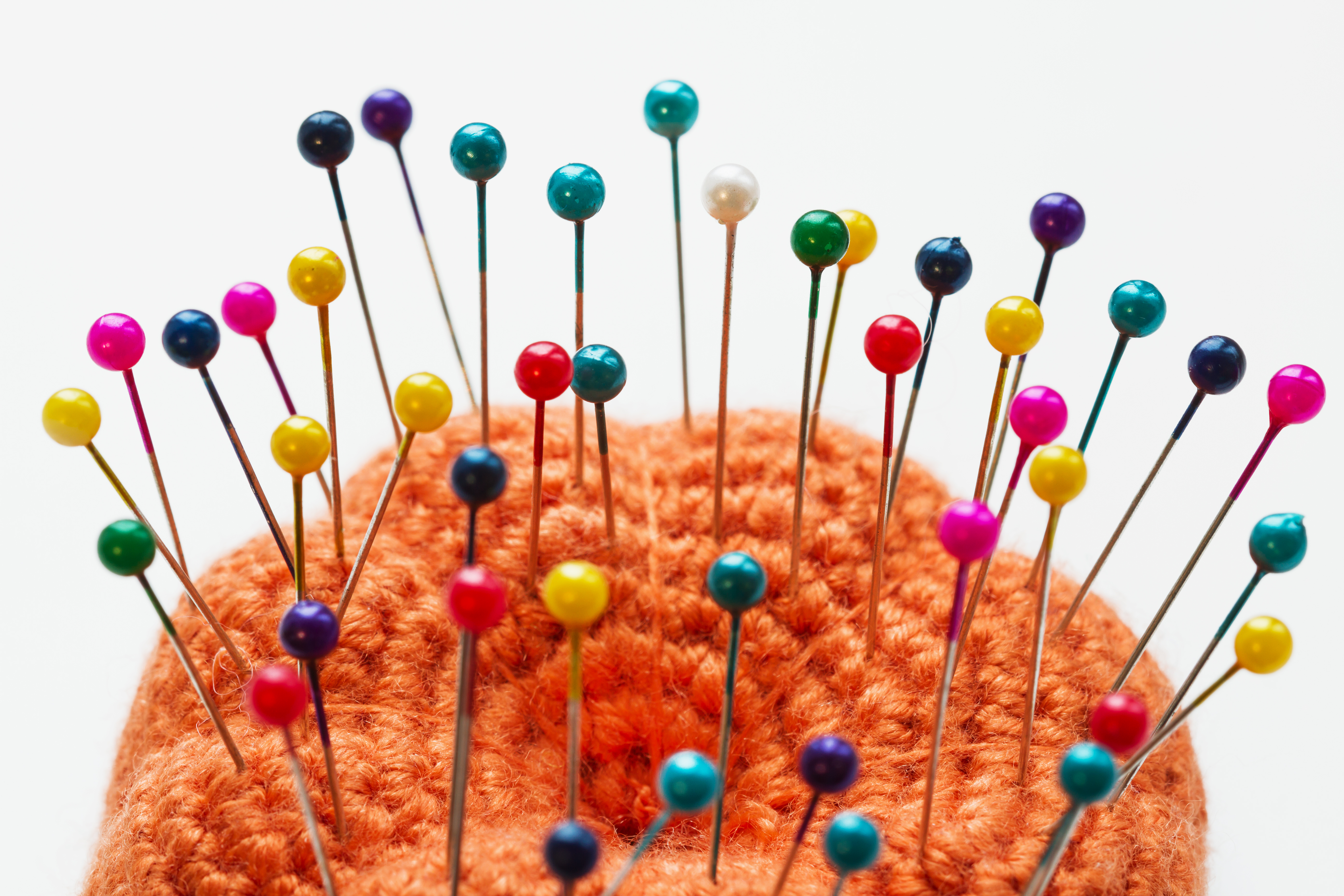 Image of Close Up View On Lots Of Sewing Pins With Colored Heads