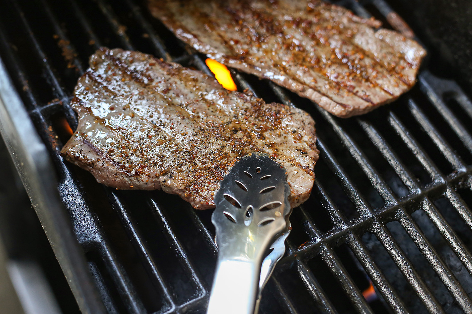 Grilling a shop round steak