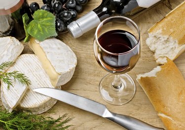 Red wine, Brie and Camembert cheeses with bread