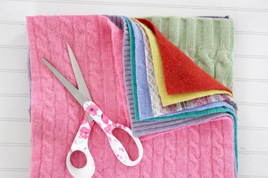 Snuggle up with a good book, a warm cup of tea, and your favorite jammies under this upcycled sweater quilt that you made yourself.