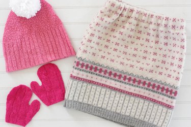 Pull out an old sweater from the bottom of your closet and create a cute and cozy sweater skirt for a little girl in your life.