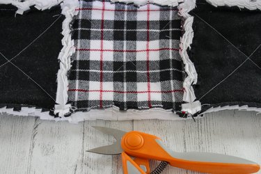 If you've wanted to try your hand at quilting, a rag quilt is the perfect place to start.