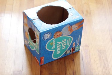 Round holes cut on sides of box