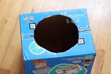 Round hole cut out of bottom of box