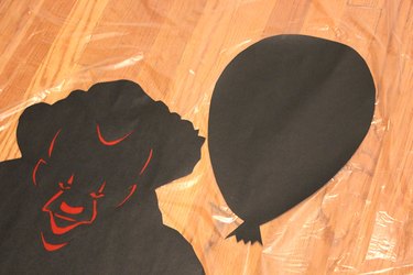 Pennywise and balloon silhouettes