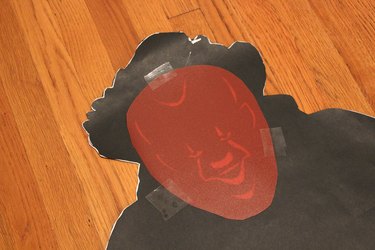 red plastic taped to black silhouette