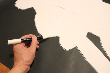 tracing template onto black paper