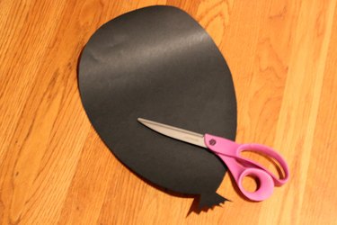 black paper balloon with scissors