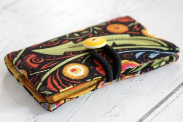 Whip up a card holder from some fabric scraps and keep your business cards organized and clean.