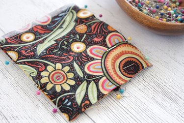 Whip up a card holder from some fabric scraps and keep your business cards organized and clean.