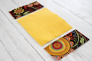 Whip up a card holder from some fabric scraps and keep your business cards organized and clean.