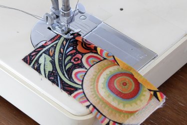 Whip up a card holder from some fabric scraps and keep your business cards organized and clean.