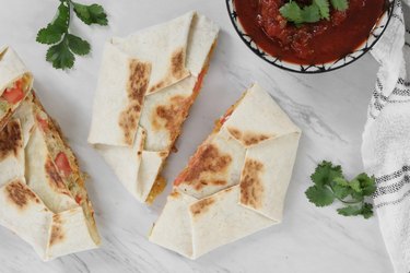 Vegan copycat Crunchwrap with salsa and cilantro