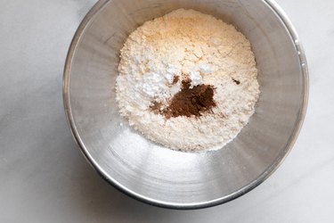 Add the dry ingredients into a mixing bowl.