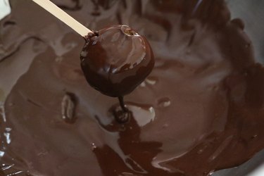 Dip truffles in melted chocolate