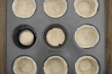 Mold dough into mini muffin pan