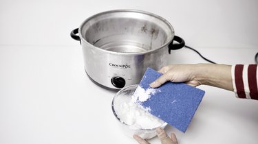 Using DIY gentle cleansing paste for slow cooker.
