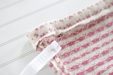 Pull out an old sweater from the bottom of your closet and create a cute and cozy sweater skirt for a little girl in your life.