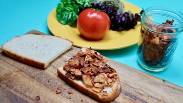 Making an amazing vegan BLT with coconut bacon.