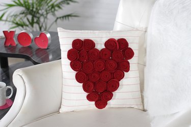 This delightful new rose pillow can be made in an afternoon for your couch, chair or maybe even your love nest.