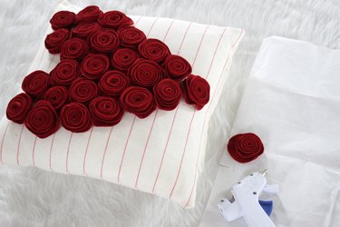 This delightful new rose pillow can be made in an afternoon for your couch, chair or maybe even your love nest.