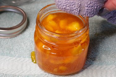 Homemade peach jam in a sterilized jar