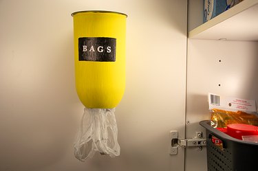 An image of a bag holder made from a 2-liter bottle.