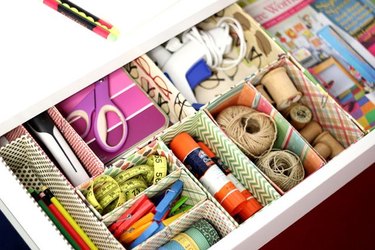 use cardboard boxes to organize junk drawers