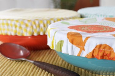 Get rid of the trash producing plastic wrap and create some colorful, reusable fabric bowl covers for all of your summer get togethers.