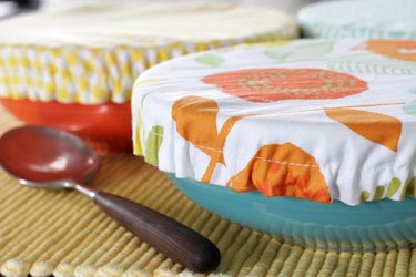 Get rid of the trash producing plastic wrap and create some colorful, reusable fabric bowl covers for all of your summer get togethers.