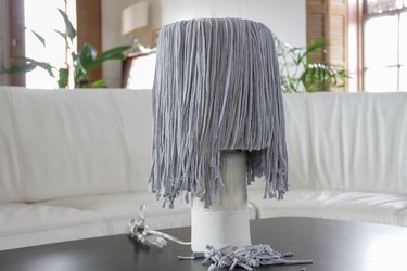 Find a few old t-shirts that have been hanging around your closet and create a whimsical fringe shade.